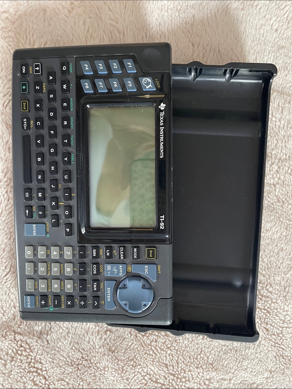 Texas Instruments TI-92 Graphing Calculator in Black and Blue